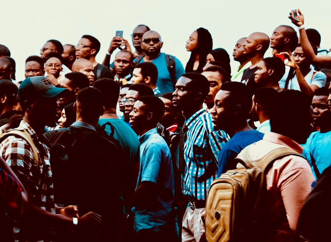 crowd discussing news